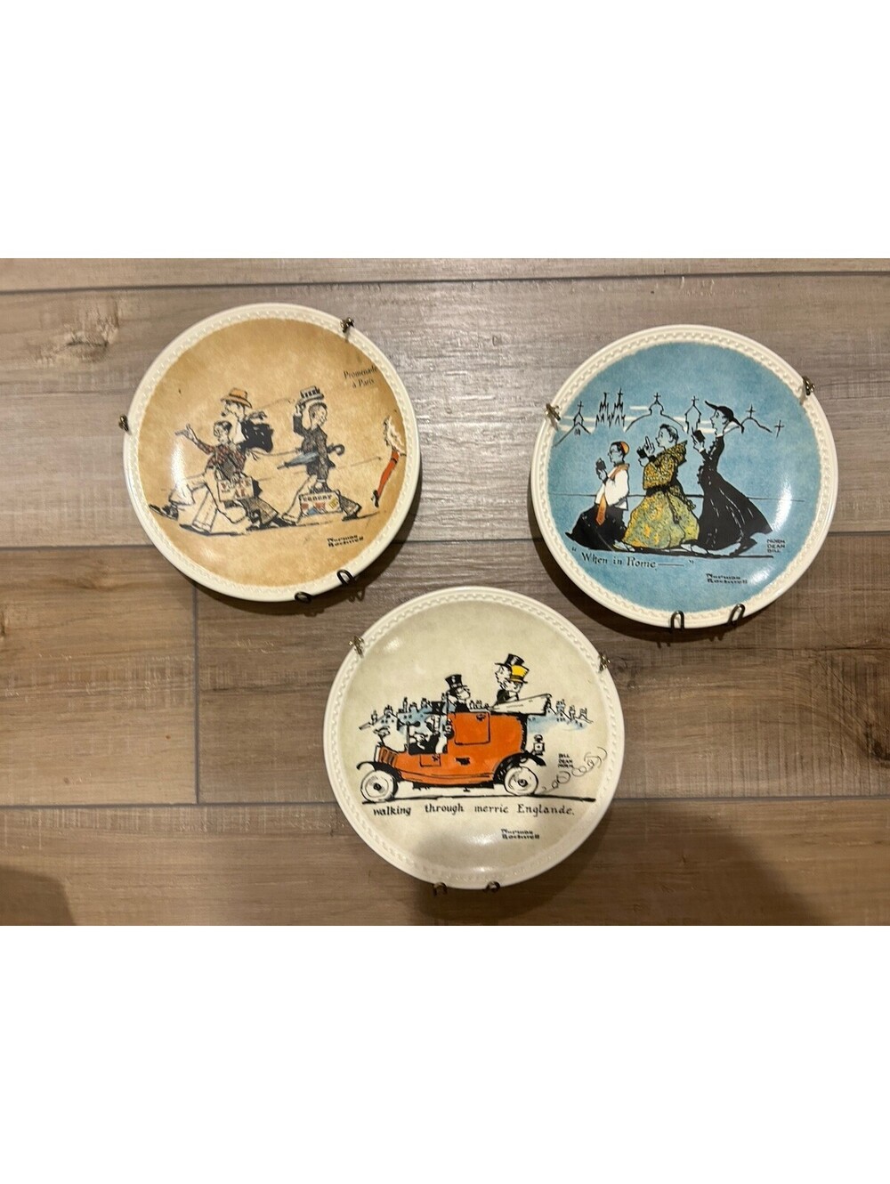 VINTAGE NORMAN ROCKWELL ON TOUR 3 WALL PLATES WITH METAL HANGER 7 3/4"